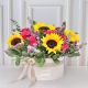 caja de flores con girasoles rosas y follajes|envio a domicilio en bogota