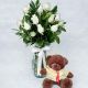 florero de rosas blancas con oso de peluche 
