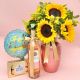florero de girasoles con chocolates, globo metalizado y botella de vino tinto o rosado  tarjeta personalizada con envio a domicilio en bogota 
