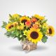 Canasta con girasoles y flores mixtas en tonos amarillos – Flores Bogotá